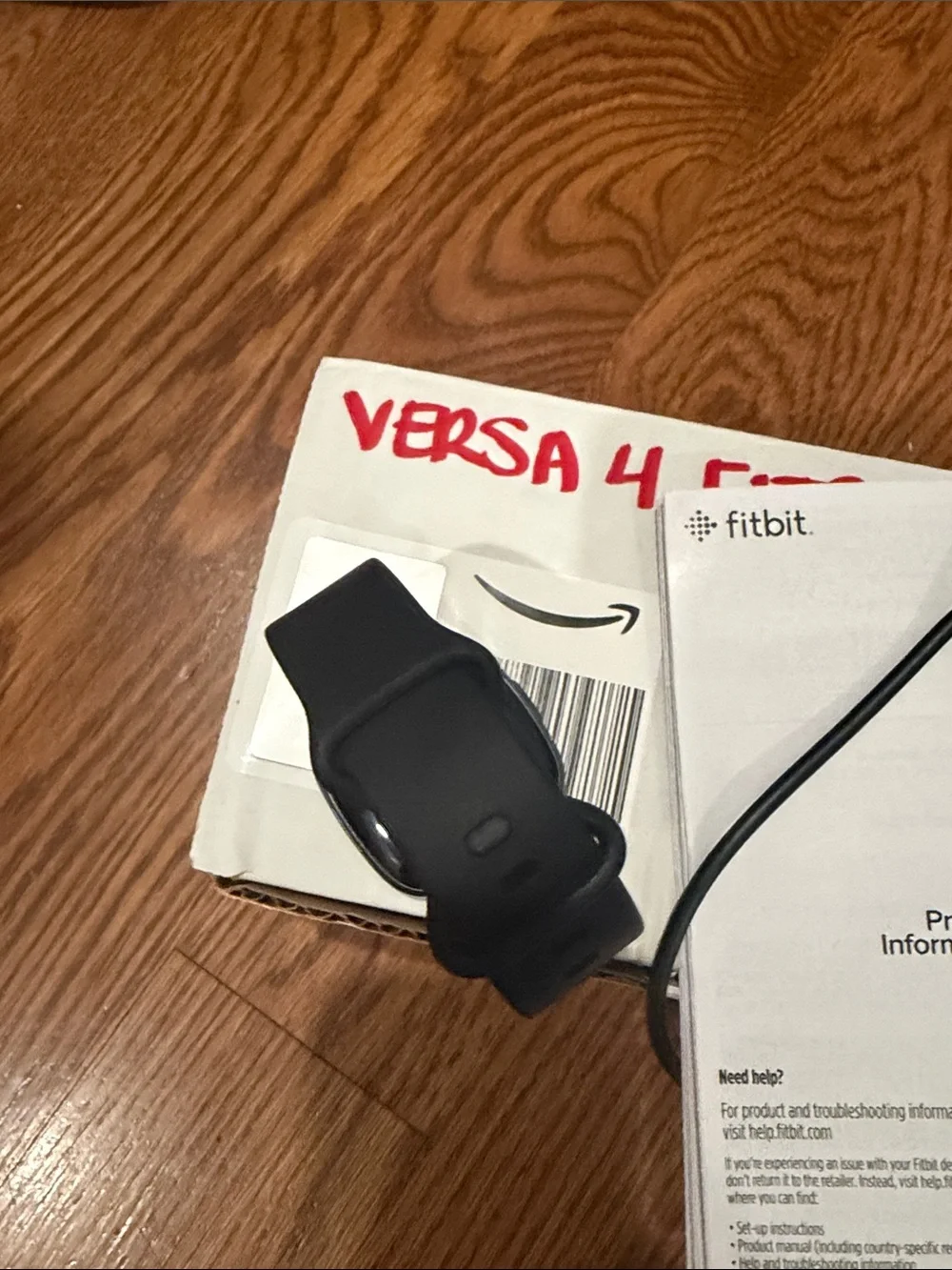 fitbit Versa 4 Smartwatch in Black with Black Band